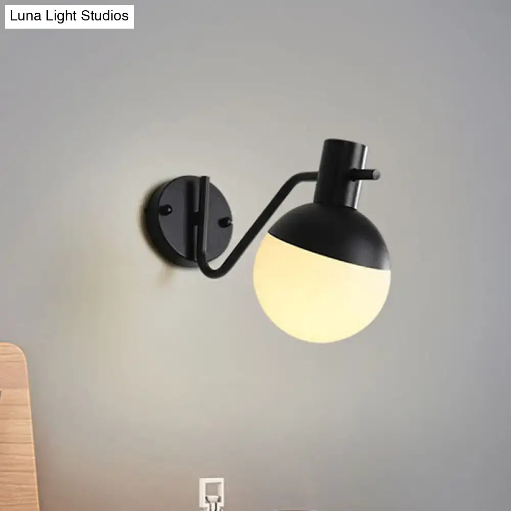 Modern black sconce light with milk glass shade living room