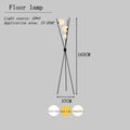 Modern black tripod moon floor lamp with white bulbs living room
