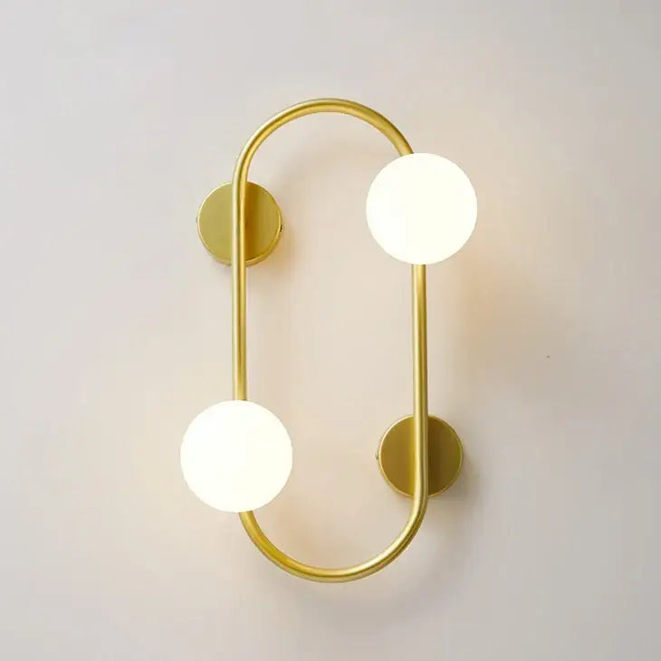 Modern black wall sconce with frosted glass globes – bedroom light