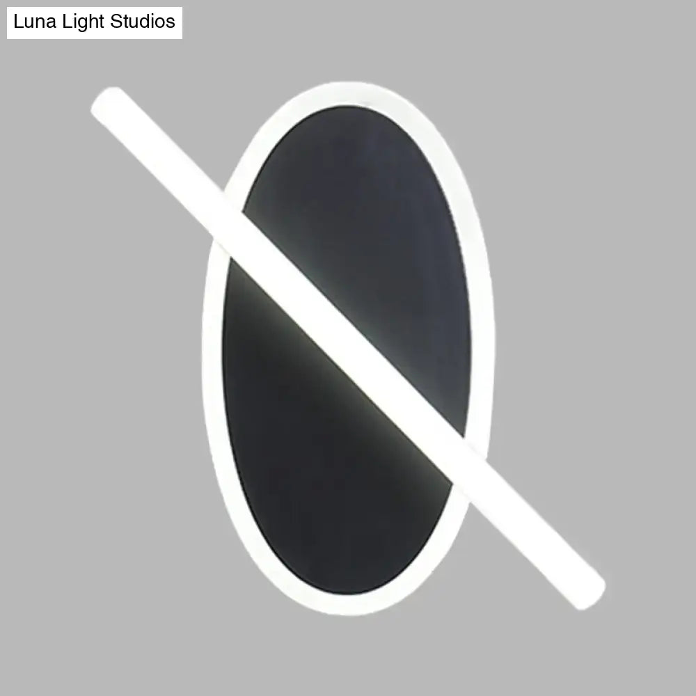 Modern black & white oval led sconce stairway light with warm glow