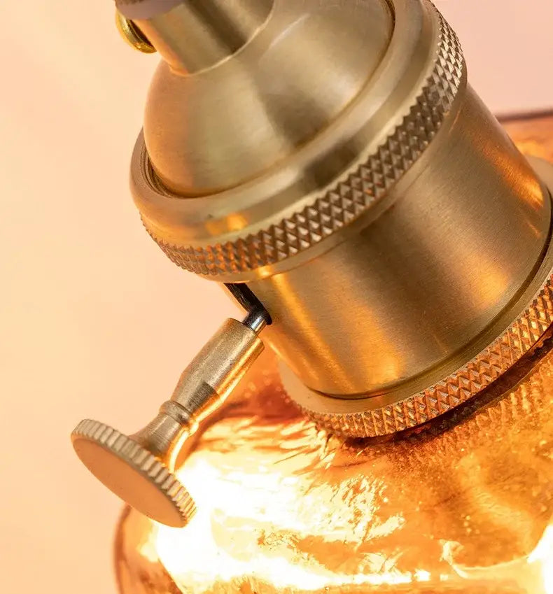 Modern brass and amber glass wall lamp for bedroom living room