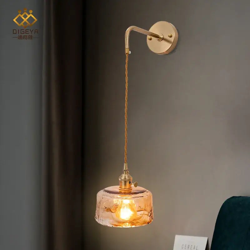Modern brass and amber glass wall lamp for bedroom living room