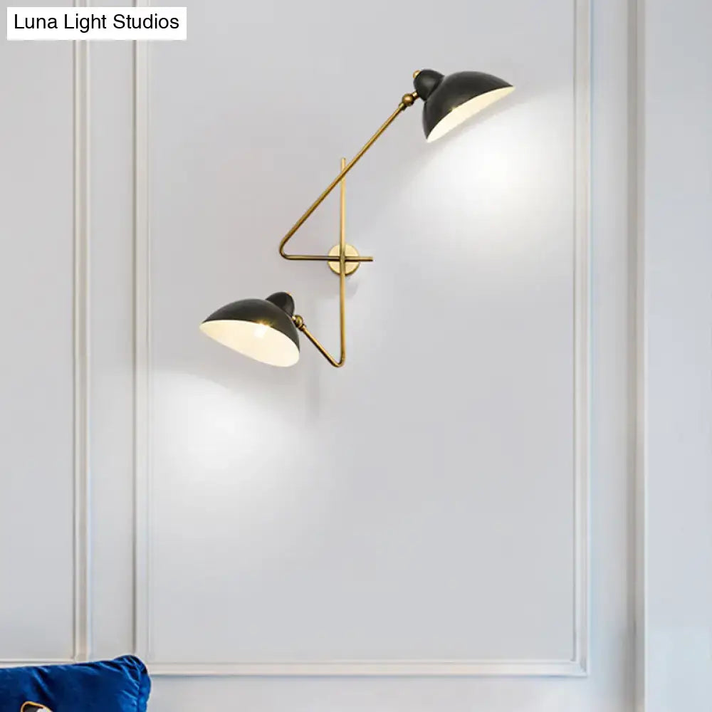 Modern brass and black duckbill wall sconce lamp – living room