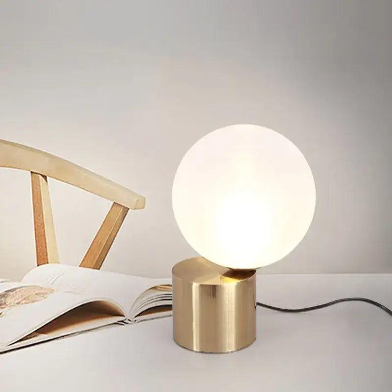 Modern brass and decorbites glass circular table lamp for bedroom