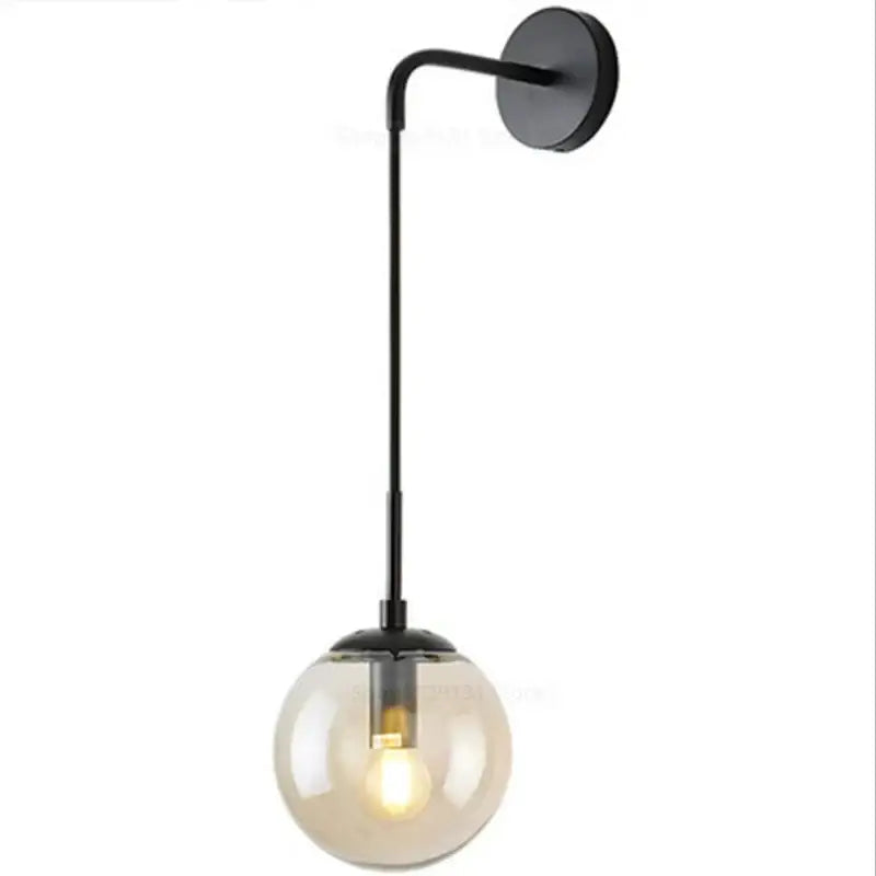 Modern brass and glass ball wall lamp for bedroom decor