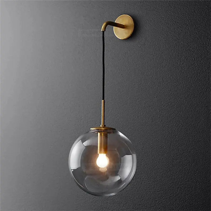 Modern brass and glass ball wall lamp for bedroom decor
