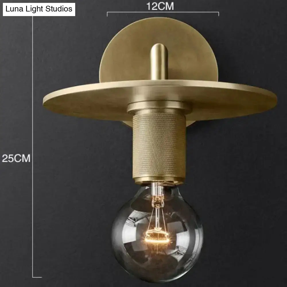 Modern brass and glass wall sconce bedroom light