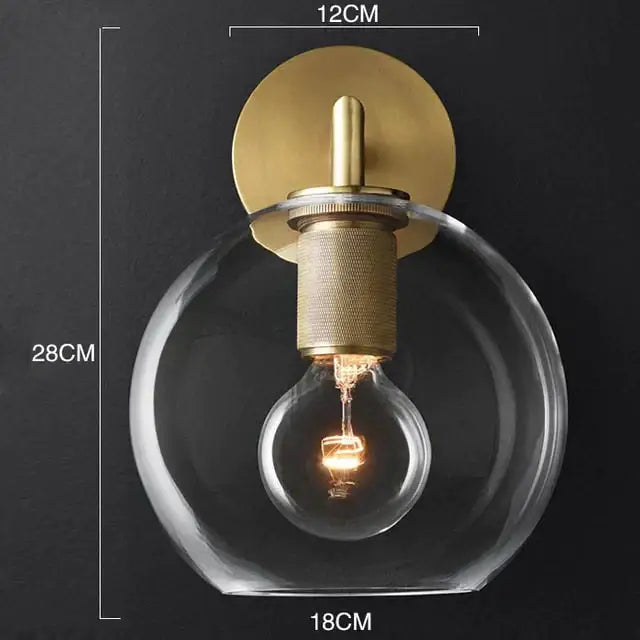 Modern brass and glass wall sconce bedroom light