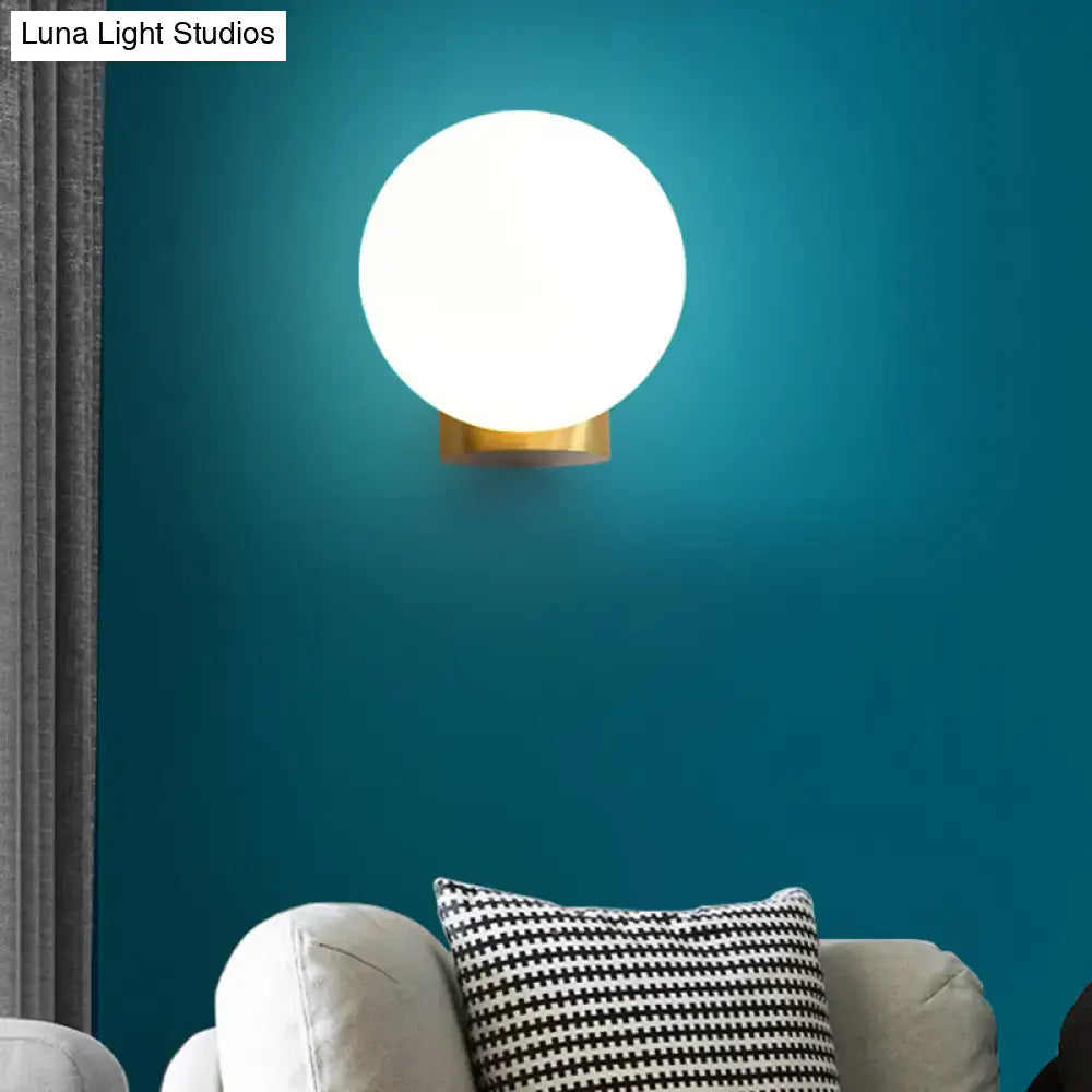 Modern brass and opal glass wall mount lamp bedside bedroom sconce