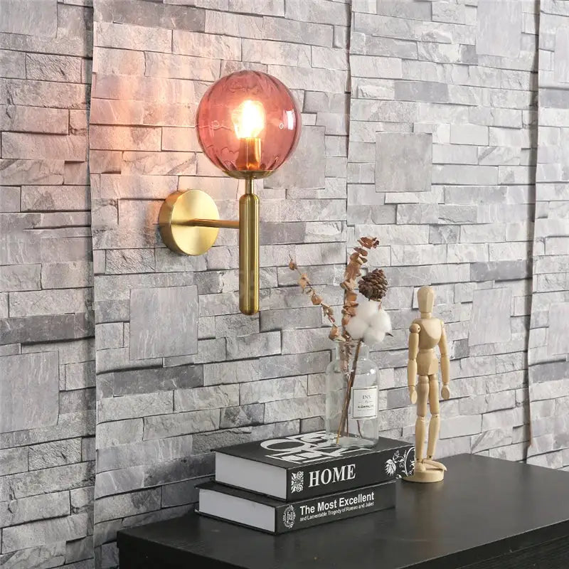Modern brass and pink glass wall lamp for living room