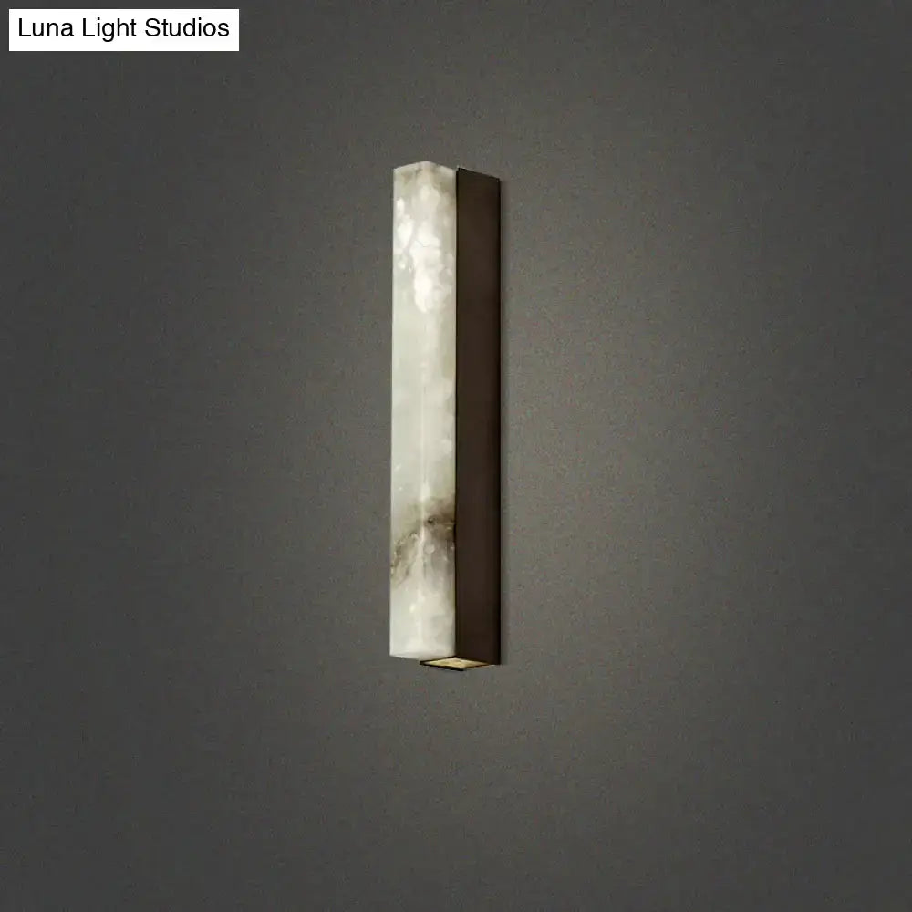 Modern brass and white onyx wall lighting – living room sconce