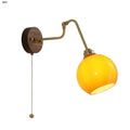 Modern brass and wood wall sconce amber led bathroom light