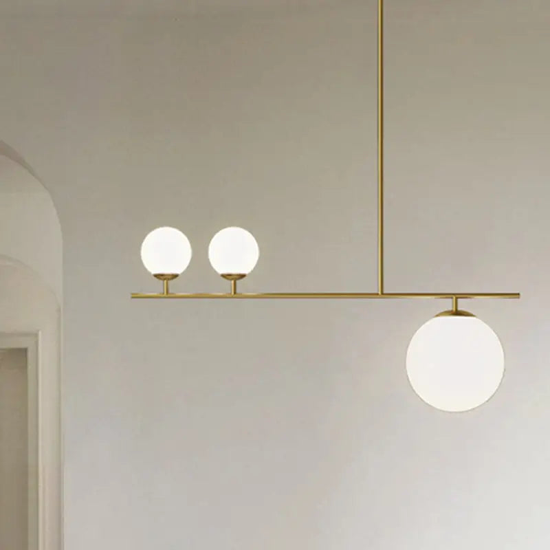 Modern brass ball pendant light opal glass island dining room