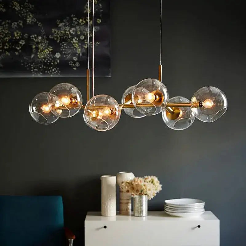 Modern brass glass ball pendant light for kitchen decor