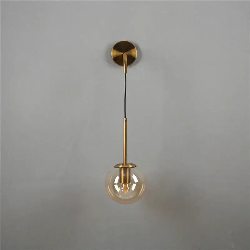 Modern brass glass ball wall lamp bedroom amber globe lighting