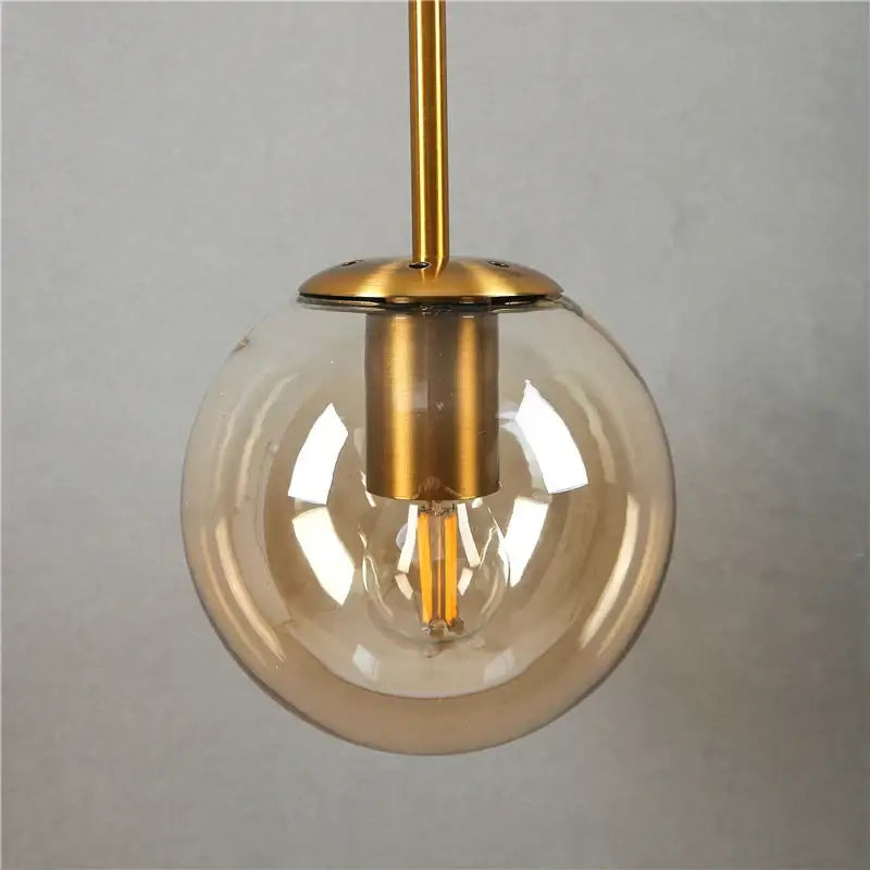 Modern brass glass ball wall lamp bedroom amber globe lighting