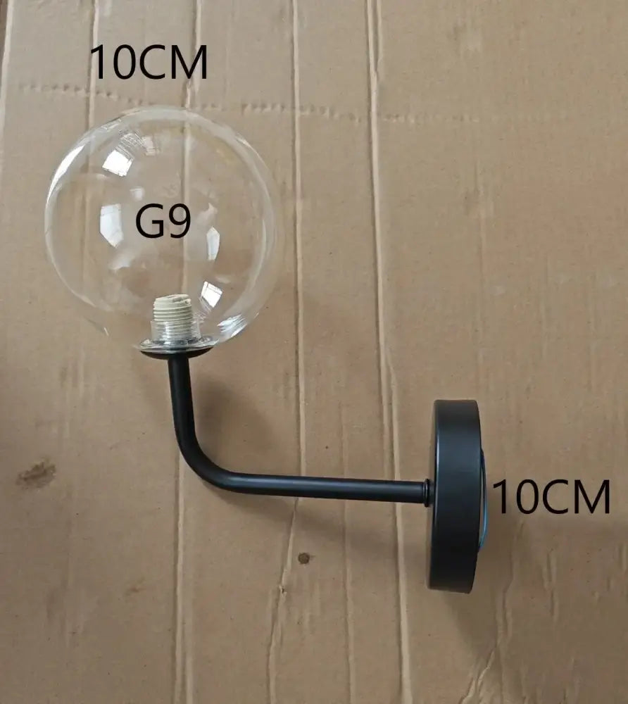 Modern brass glass ball wall lamp bedroom amber globe lighting