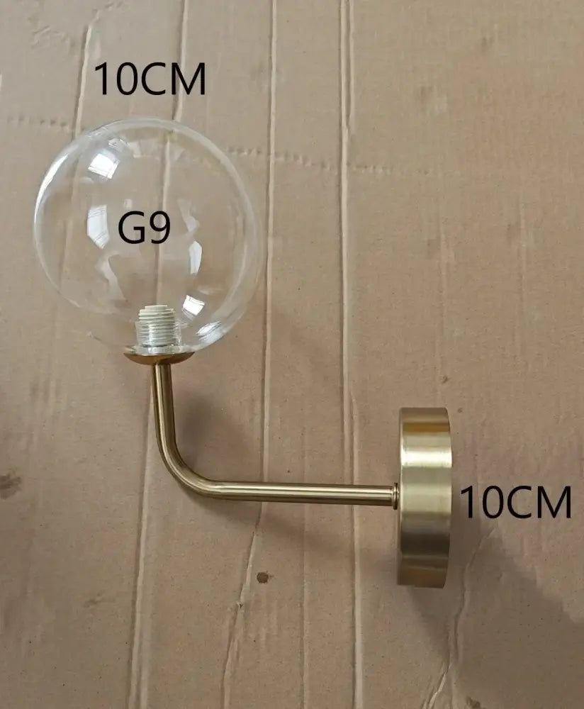 Modern brass glass ball wall lamp bedroom amber globe lighting