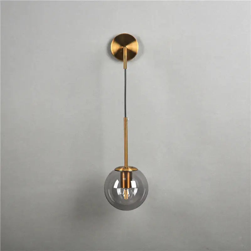 Modern brass glass ball wall lamp bedroom amber globe lighting