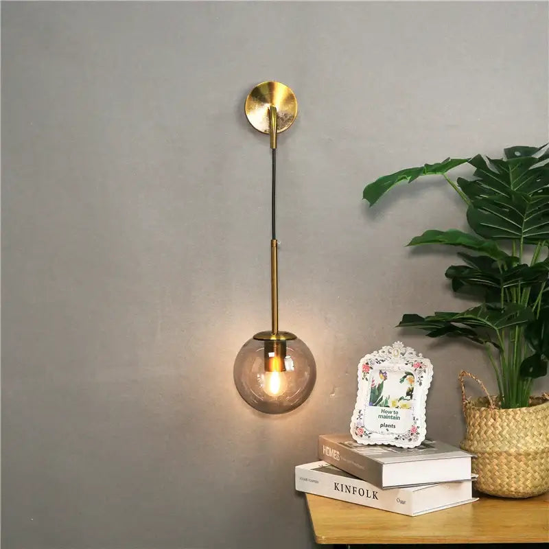 Modern brass glass ball wall lamp bedroom amber globe lighting