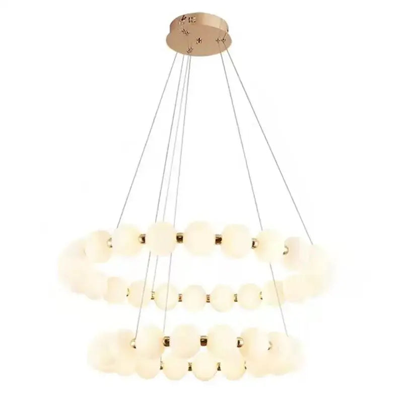 Modern brass led pendant light with frosted spheres for living room