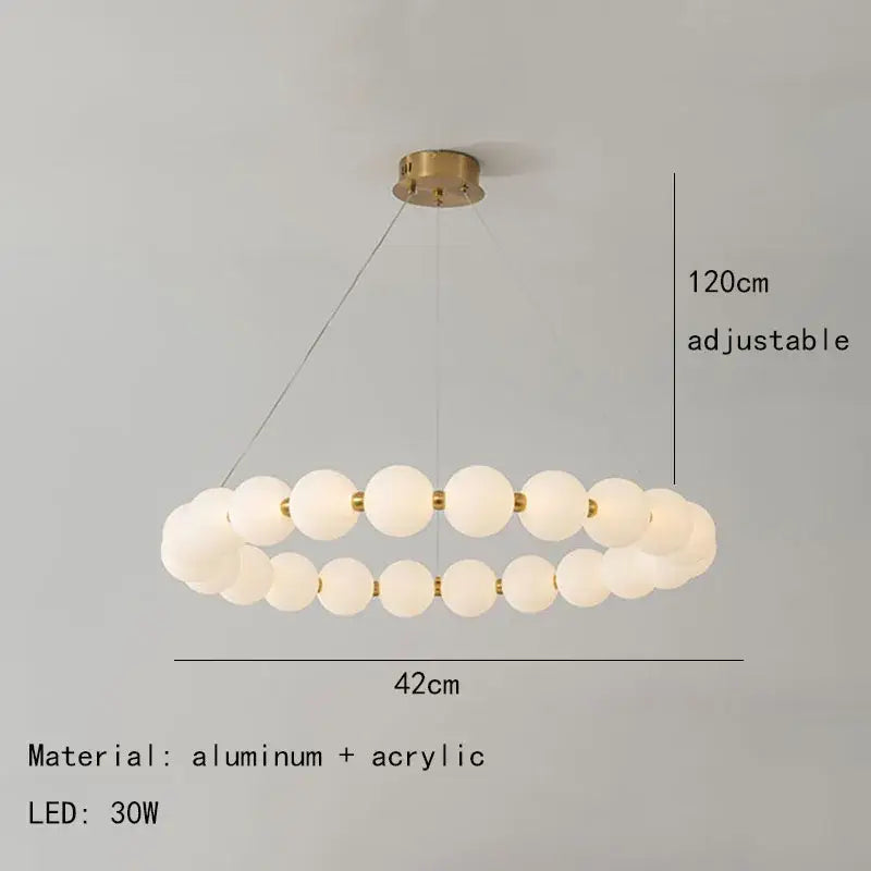 Modern brass led pendant light with frosted spheres for living room