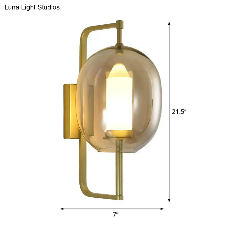 Modern brass oval clear glass shade wall sconce bedroom light