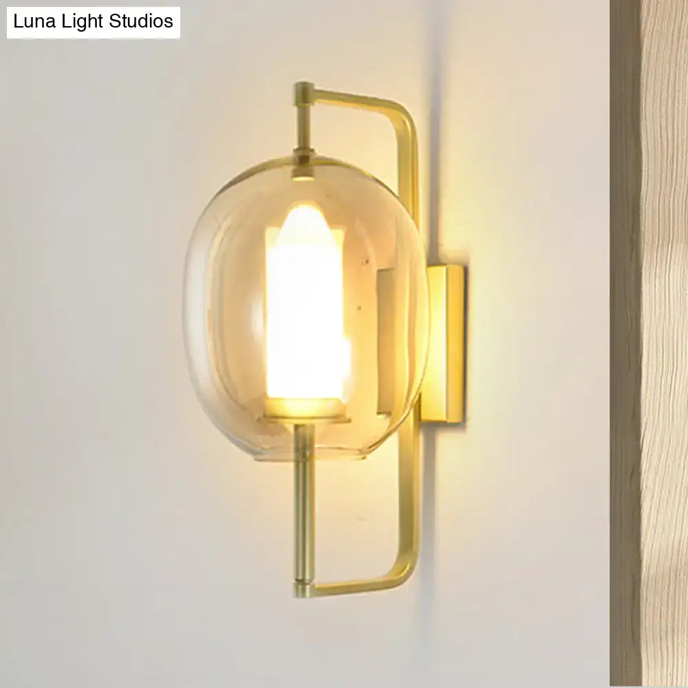 Modern brass oval clear glass shade wall sconce bedroom light