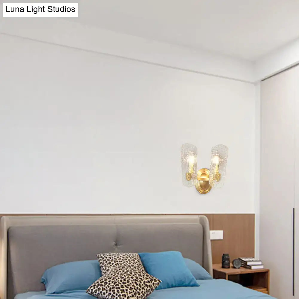 Modern brass sconce with clear water glass for living room two lights