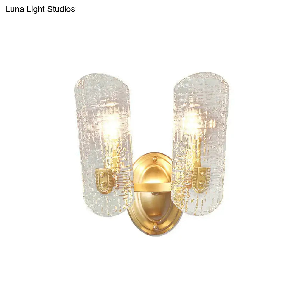 Modern brass sconce with clear water glass for living room two lights