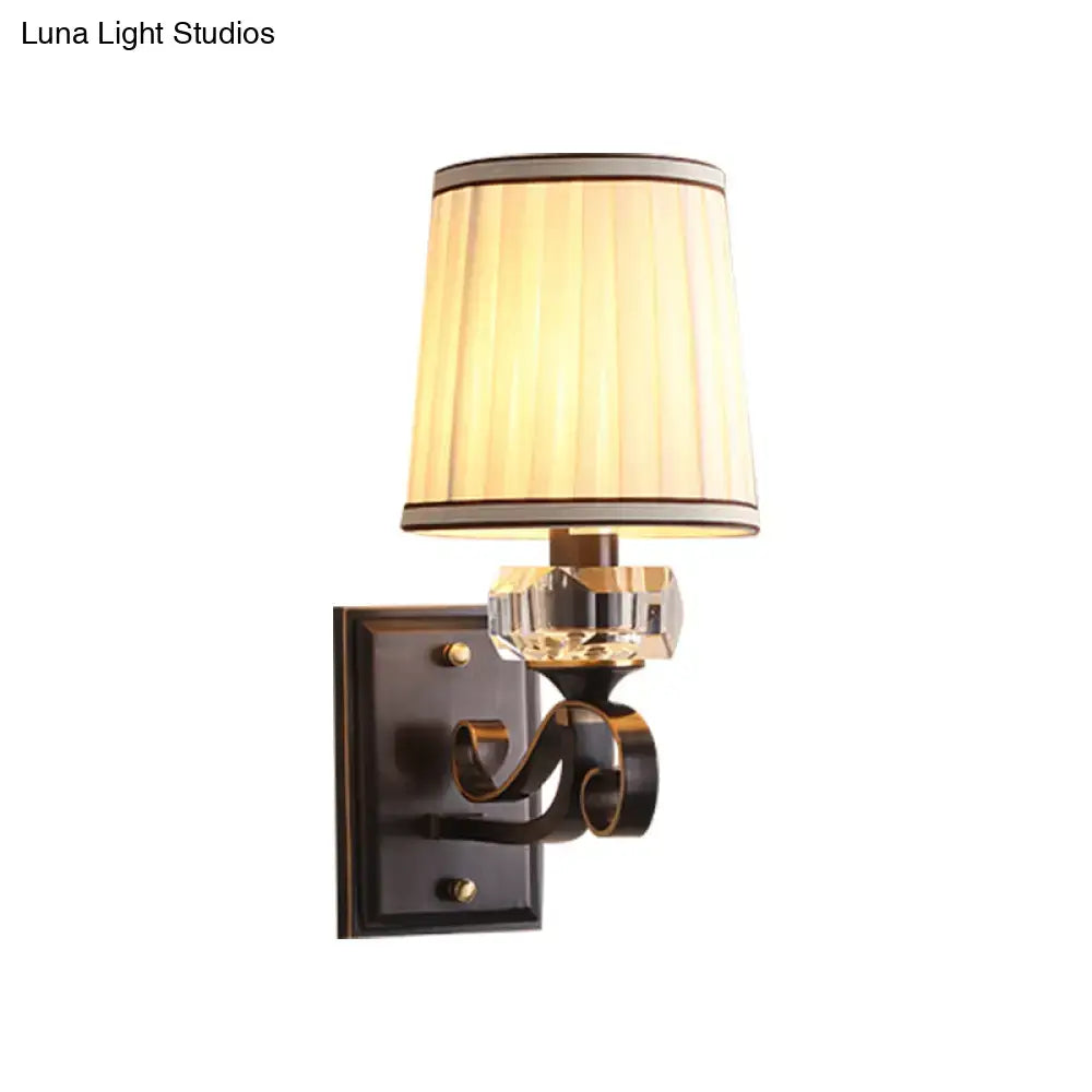 Modern brass wall lamp – bedroom sconce with pleated shade