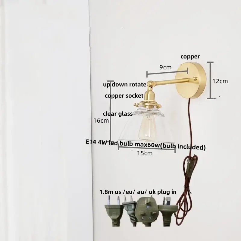 Modern brass wall lamp with clear glass shade bedroom reading light