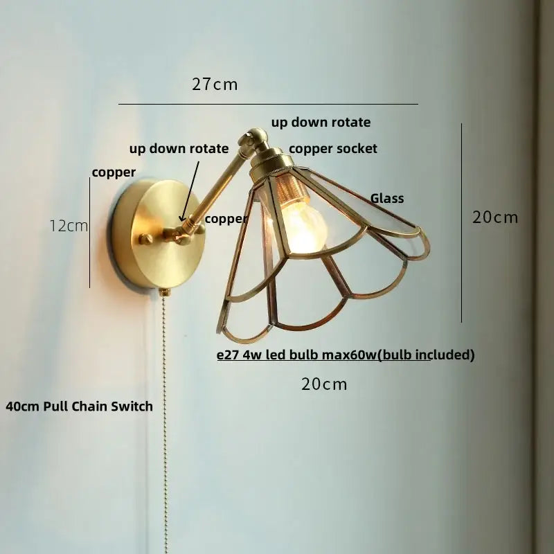 Modern brass wall lamp with clear glass shade bedroom reading light