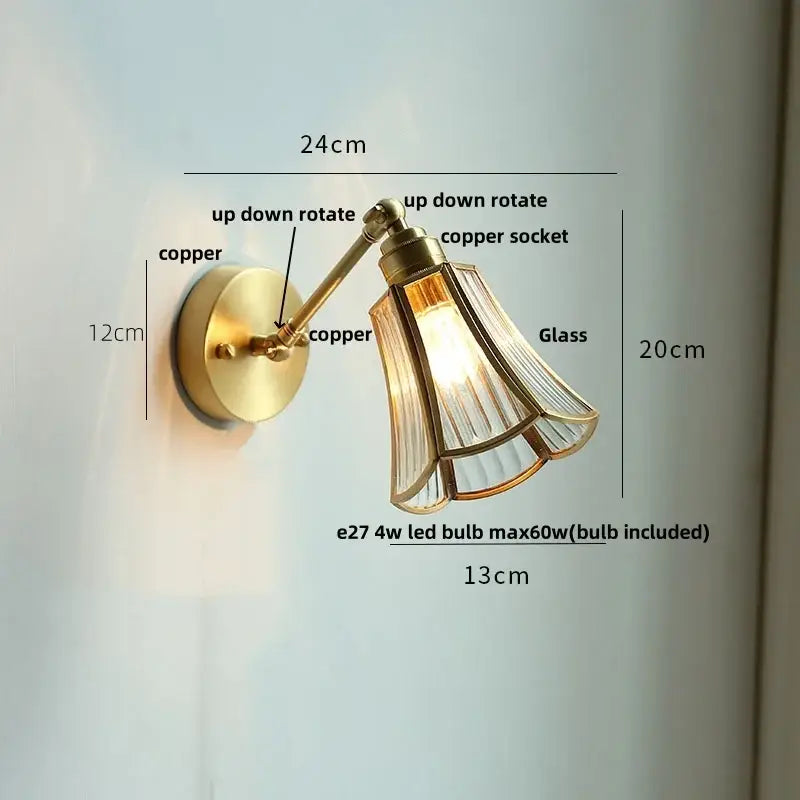 Modern brass wall lamp with clear glass shade bedroom reading light