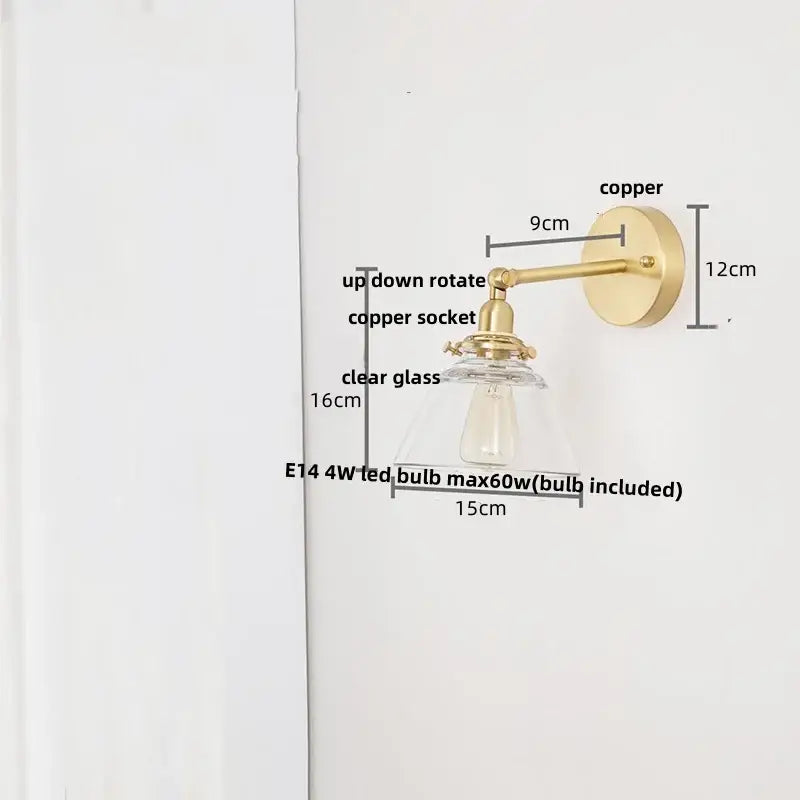 Modern brass wall lamp with clear glass shade bedroom reading light
