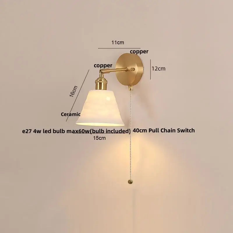 Modern brass wall lamp with frosted glass shade for bedroom reading