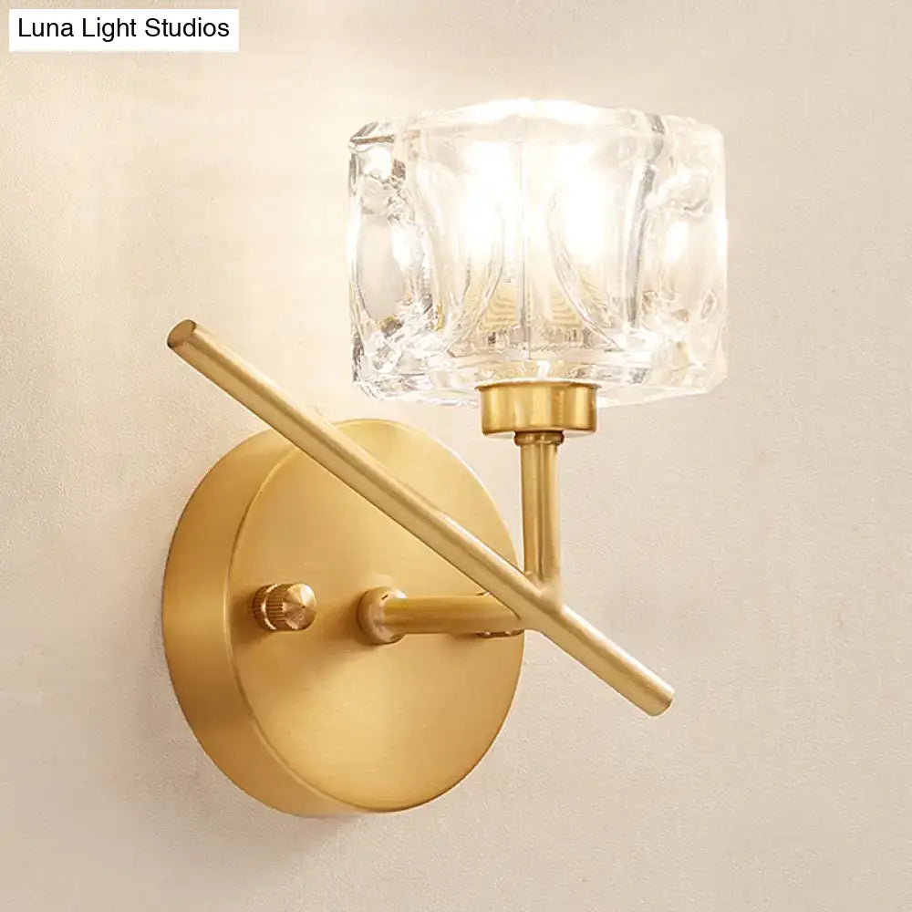 Modern brass wall light with clear crystal shade – bedroom sconce