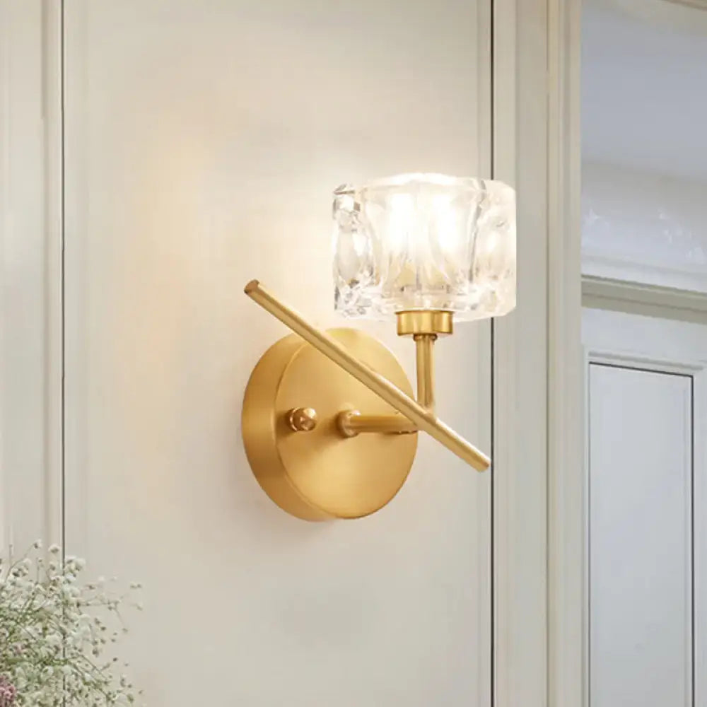 Modern brass wall light with clear crystal shade – bedroom sconce