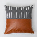 Modern brown faux leather and geometric pillow cover living room