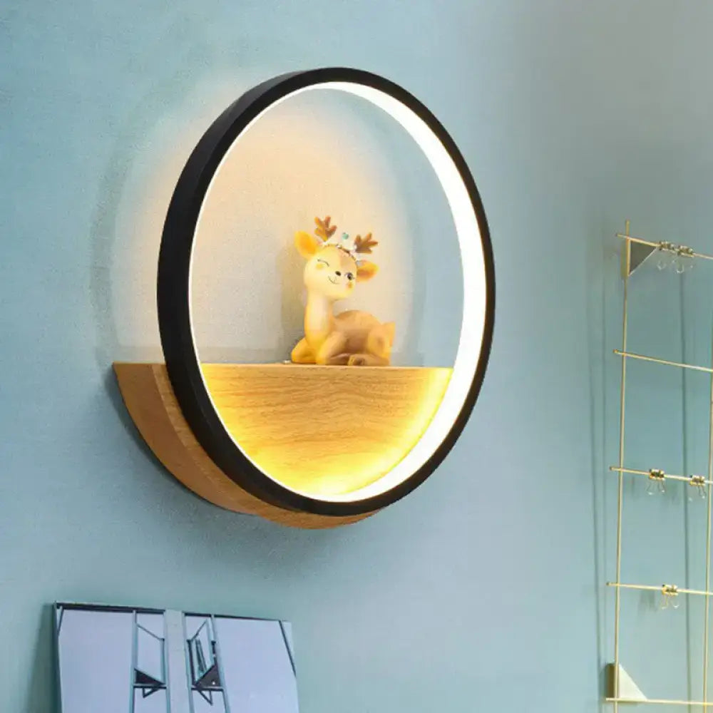 Modern circular black wall light with decorative deer living room