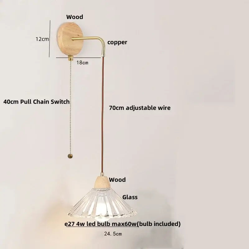 Modern copper and wood wall sconce with clear glass pull chain switch