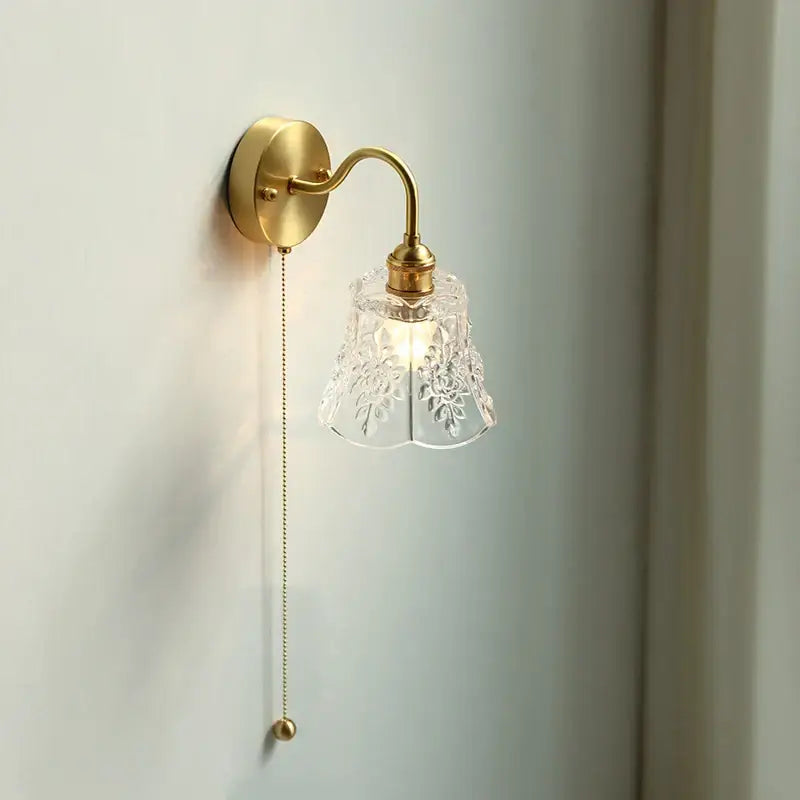 Modern copper wall sconce with clear glass bedroom pull chain light