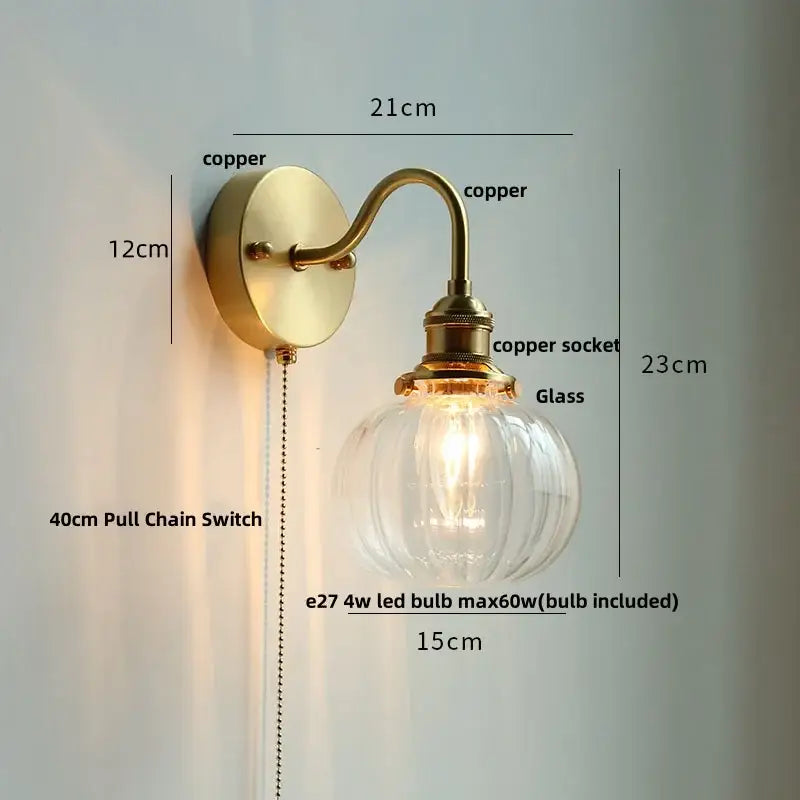 Modern copper wall sconce with clear glass bedroom pull chain light