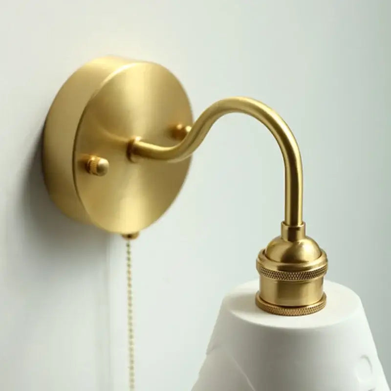 Modern copper wall sconce with clear glass bedroom pull chain light