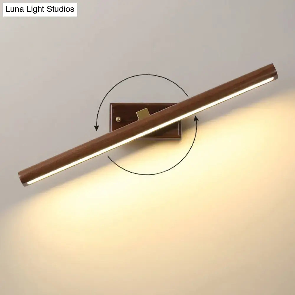 Modern dark wood linear wall sconce bathroom vanity light