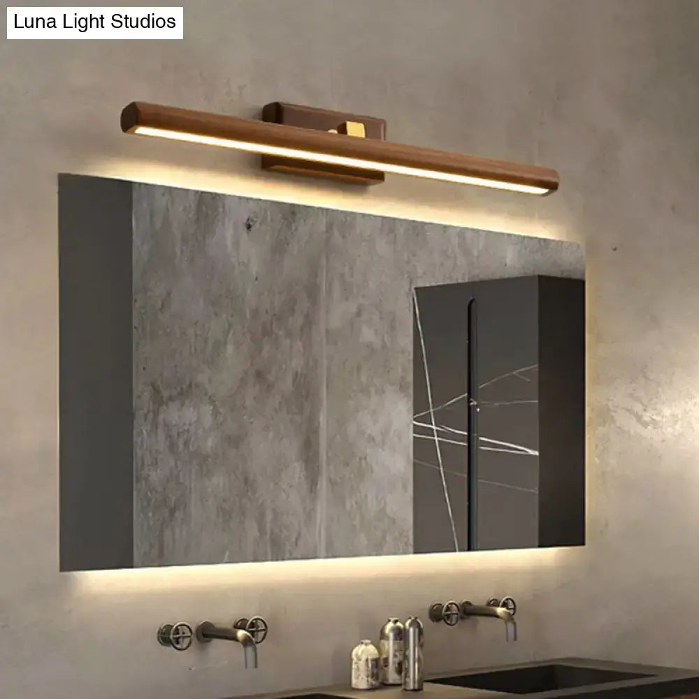 Modern dark wood linear wall sconce bathroom vanity light