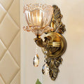 Modern floral brass wall sconce with teardrop crystal drop living room