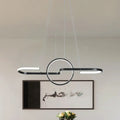 Modern geometric led dining room light in black & gold warm white light