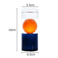 Modern geometric orange & black crystal candle holders dining room