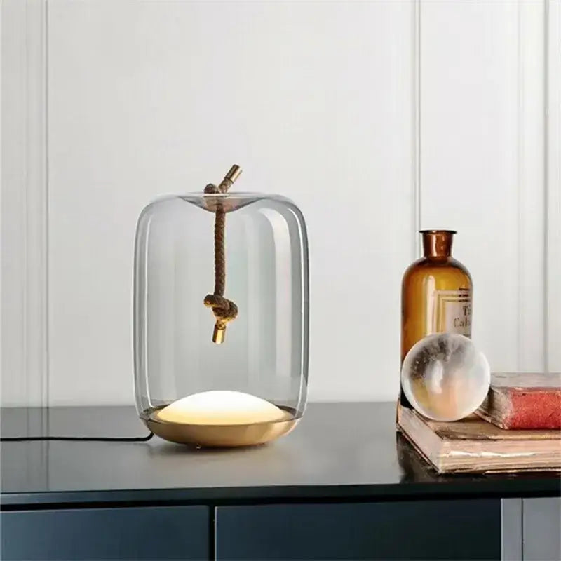 Modern glass knot table lamp with brass base for bedroom decor